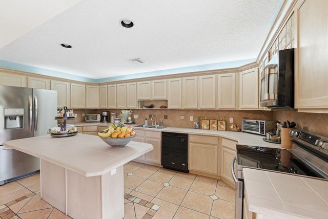 180 Elaine Road, West Palm Beach, FL 33415