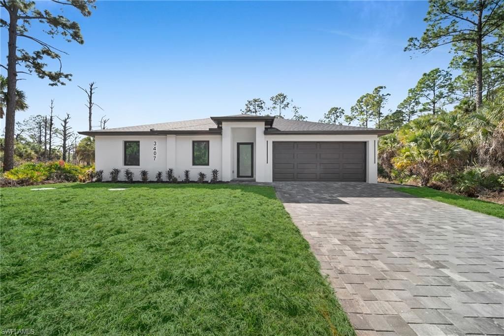 3407 65th ST W, LEHIGH ACRES, FL 33971 — exterior