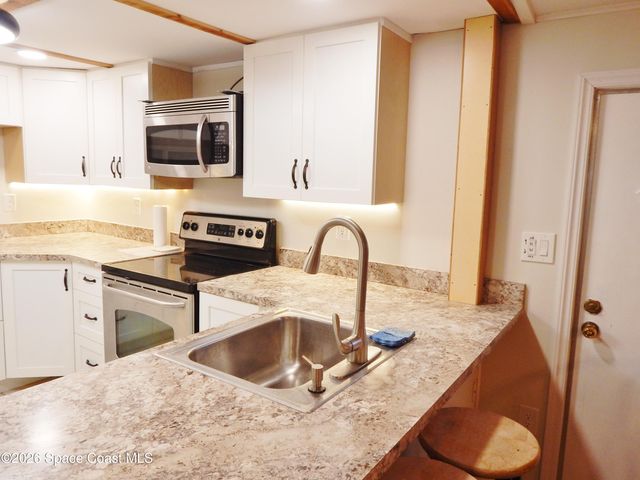 1328 Turkey Creek Drive NE, Palm Bay, FL 32905