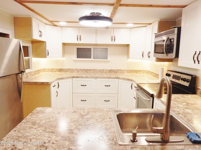 1328 Turkey Creek Drive NE, Palm Bay, FL 32905