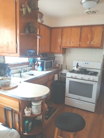7129 S Oakley Avenue, Chicago, IL 60636