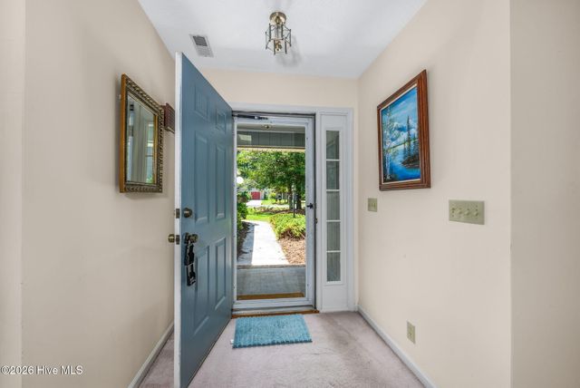14 Canal Way Court, Carolina Shores, NC 28467