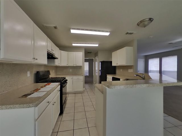 1702 Glacier Blue Drive, Fresno, TX 77545