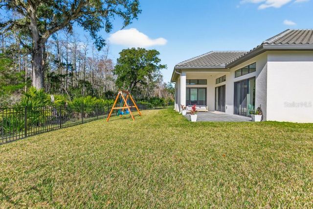 67 NEW LEATHERWOOD DR, Palm Coast, FL 32137