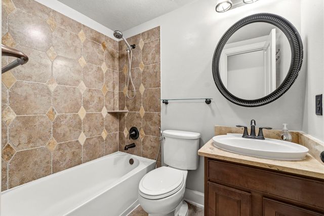 27 N Arrow Canyon Circle, The Woodlands, TX 77389