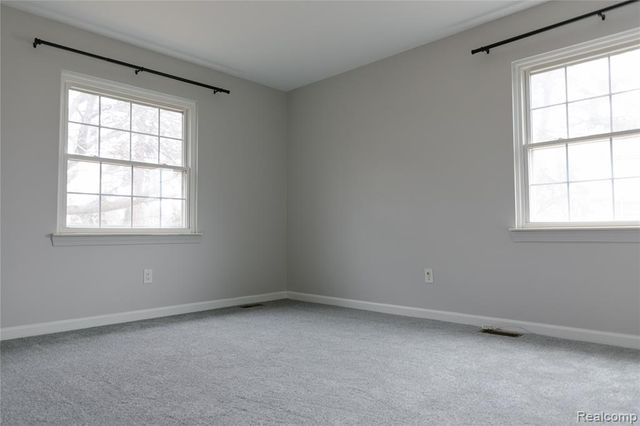 207 Neptune Drive, Walled Lake, MI 48390