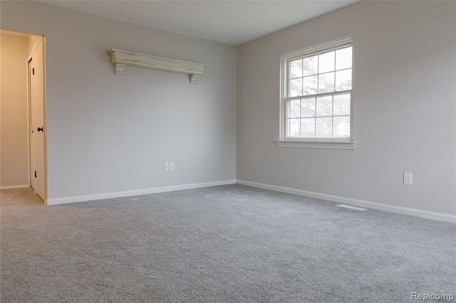 207 Neptune Drive, Walled Lake, MI 48390