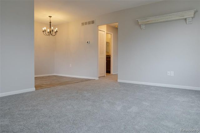 207 Neptune Drive, Walled Lake, MI 48390