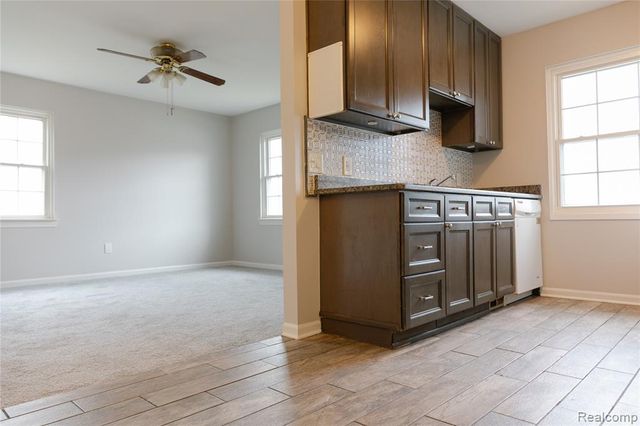 207 Neptune Drive, Walled Lake, MI 48390