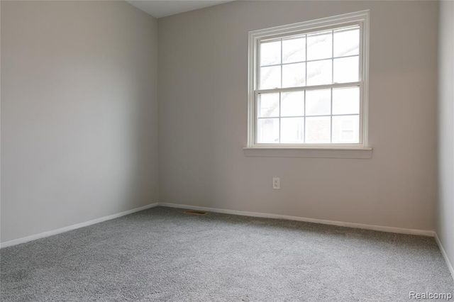 207 Neptune Drive, Walled Lake, MI 48390