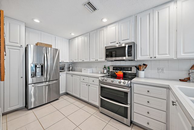107 Rivinia Drive, Jupiter, FL 33458
