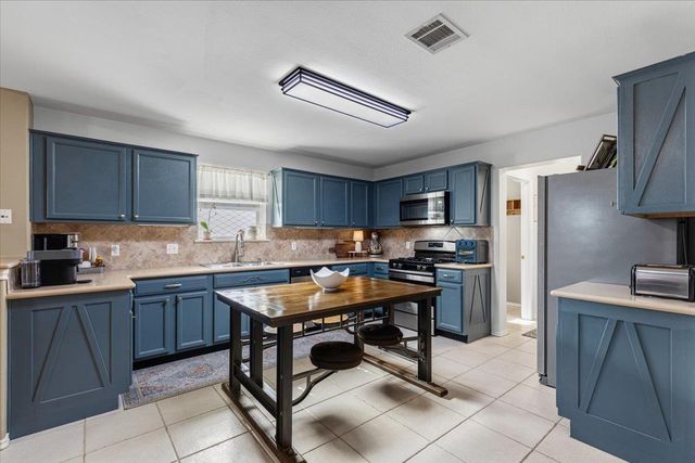 1408 Tumbling River DR, Leander, TX 78641