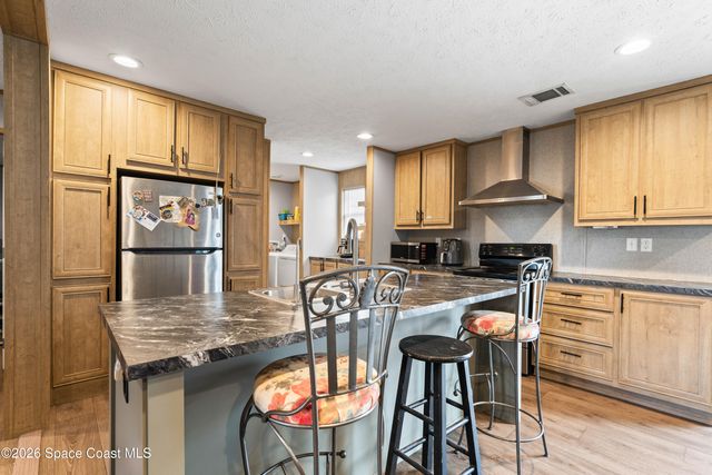 958 Pecan Circle, Barefoot Bay, FL 32976