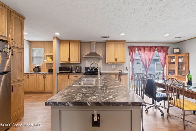 958 Pecan Circle, Barefoot Bay, FL 32976