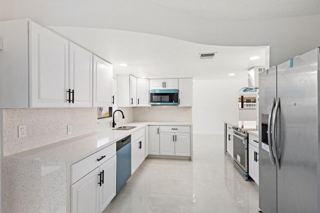 1633 WOODS BEND Road, West Palm Beach, FL 33406