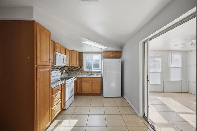 3029 HUNTINGTON ROAD, Holiday, FL 34691