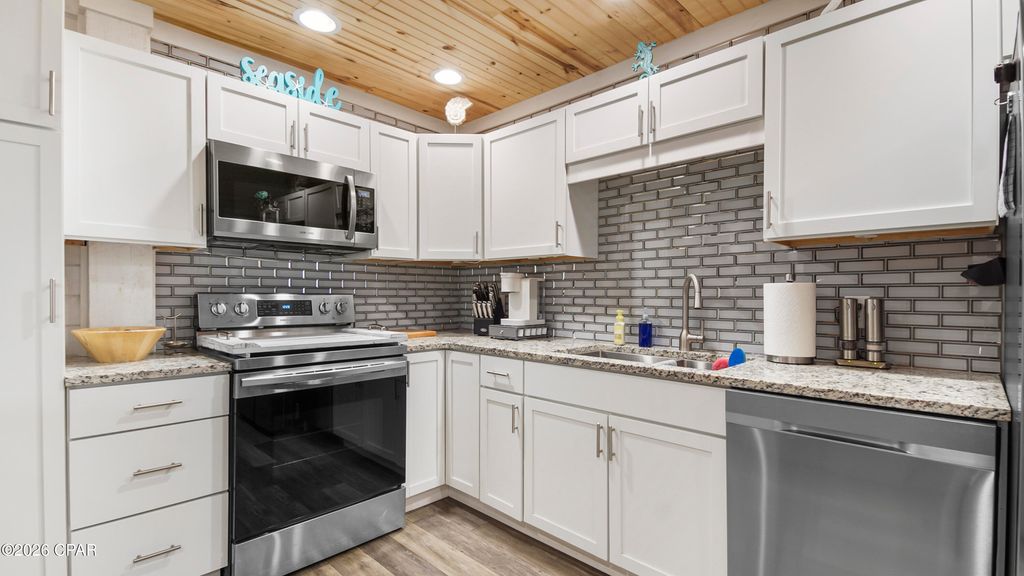 Image 15 of property listing at 7013 S Lagoon Drive, Panama City Beach, FL 32408