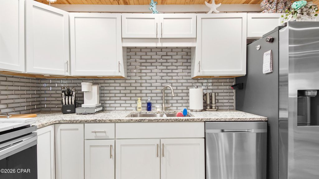 Image 16 of property listing at 7013 S Lagoon Drive, Panama City Beach, FL 32408