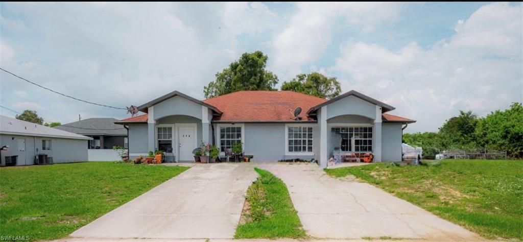 716-718 Ichabod AVE, LEHIGH ACRES, FL 33973 — exterior