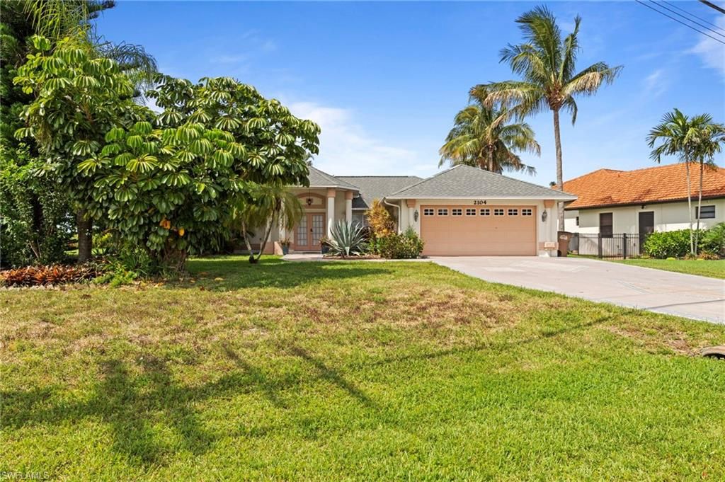 Image 1 of property listing at 2104 SW 38th TER, Cape Coral, FL 33914