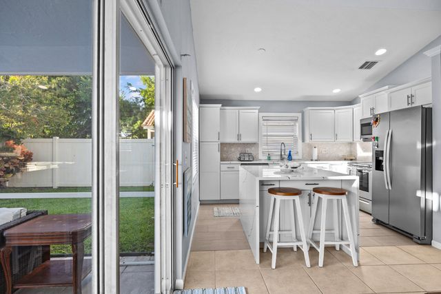 1664 Carriage Brooke Drive, Wellington, FL 33414