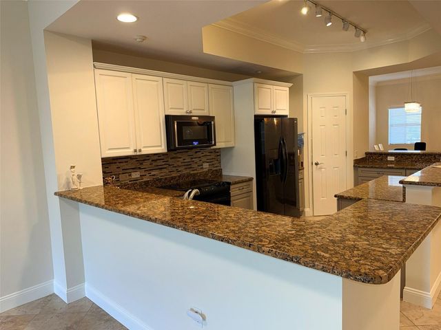7702 LAKE VISTA COURT 303, Lakewood Ranch, FL 34202