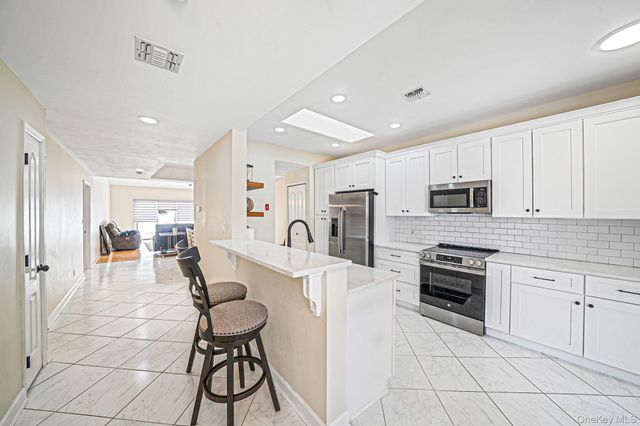 3 Windwatch Drive, Hauppauge, NY 11788