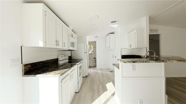 26242 DAYFLOWER BOULEVARD, Wesley Chapel, FL 33544