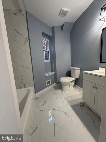 715 E 23RD ST, Baltimore, MD 21218