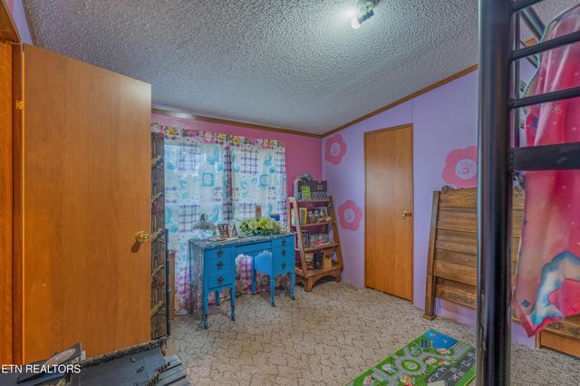 1725 Genesis Rd, Lancing, TN 37770