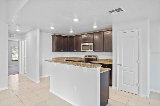 1180 MOYLE WAY, Mascotte, FL 34753