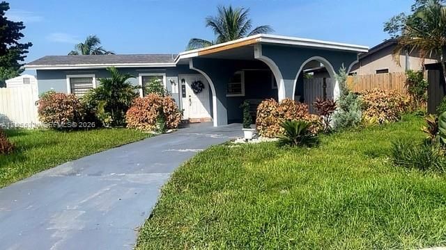 6260 Kimberly Boulevard, North Lauderdale, FL 33068