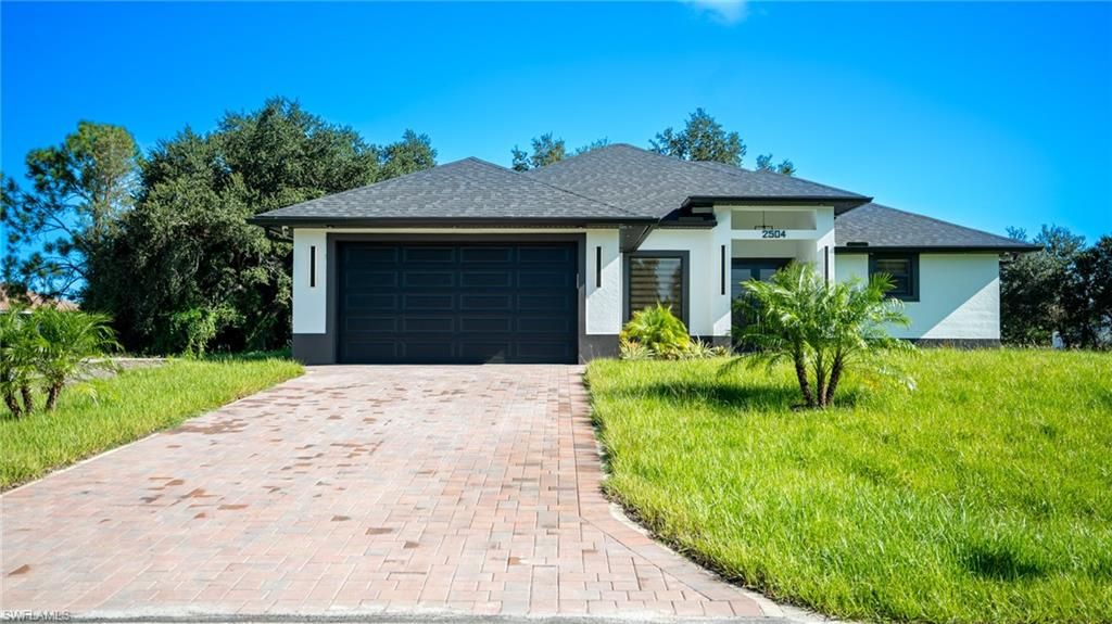 2504 52nd ST SW, LEHIGH ACRES, FL 33976 — exterior