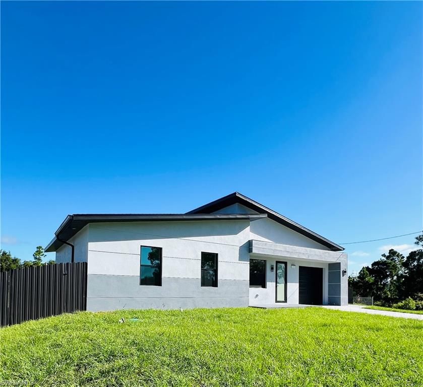 1131 Fogia ST E, LEHIGH ACRES, FL 33974 — photo 2