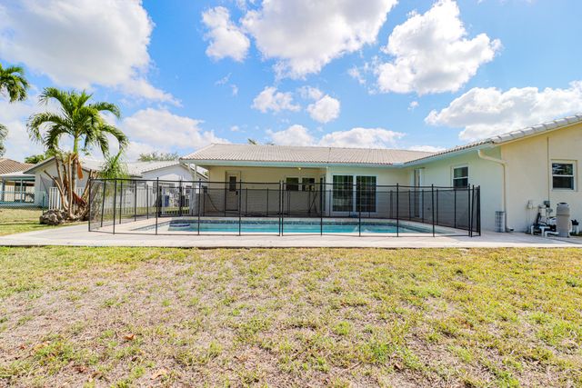 1329 NW 84th Drive NW, Coral Springs, FL 33071