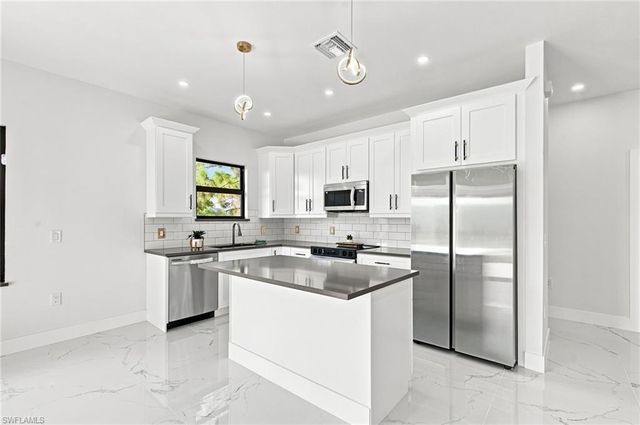 2818 13th ST SW, Lehigh Acres, FL 33976