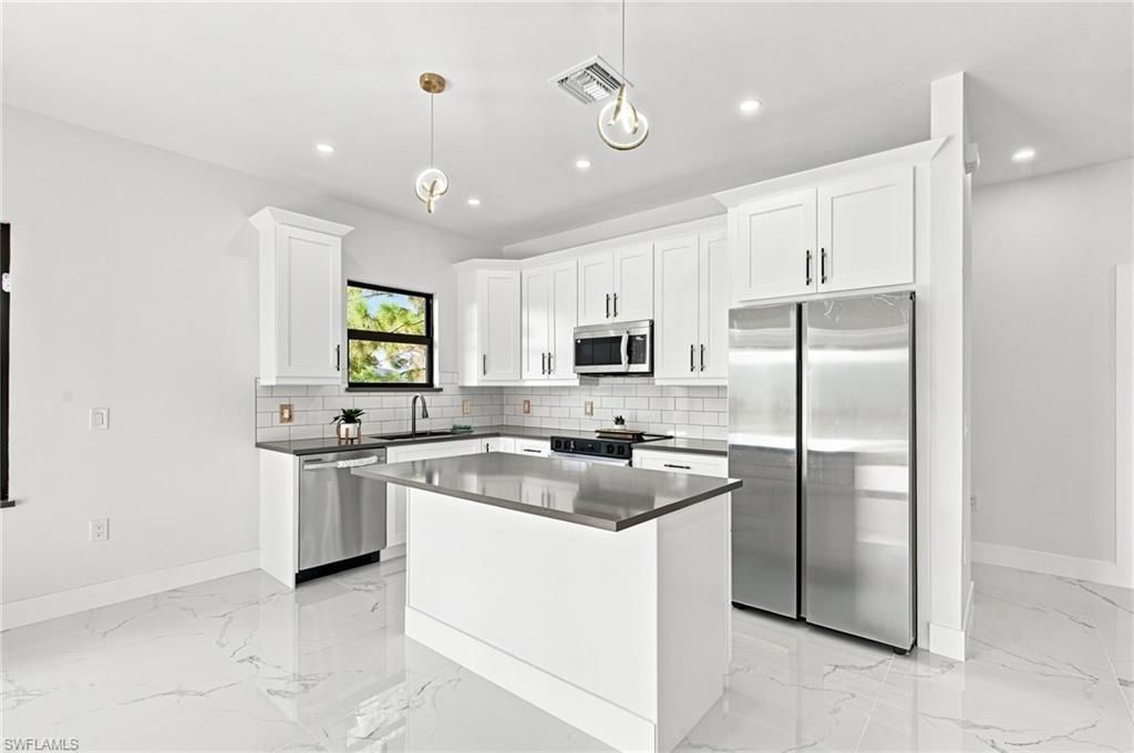 2818 13th ST SW, LEHIGH ACRES, FL 33976 — photo 4