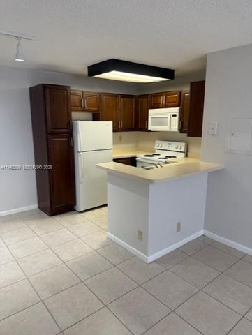 631 Lyons Rd 12101, Coconut Creek, FL 33063