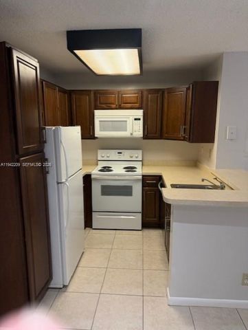 631 Lyons Rd 12101, Coconut Creek, FL 33063