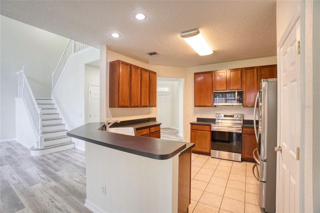 7330 CYPRESS GROVE ROAD 74, Orlando, FL 32819
