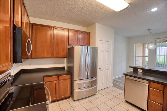 7330 CYPRESS GROVE ROAD 74, Orlando, FL 32819