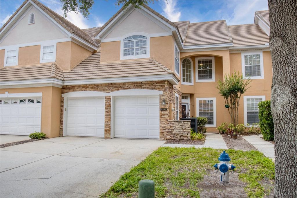 Image 2 of property listing at 7330 CYPRESS GROVE ROAD 74, Orlando, FL 32819