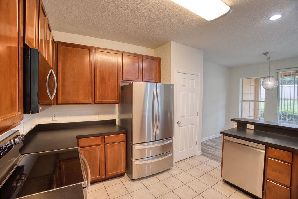 Image 15 of property listing at 7330 CYPRESS GROVE ROAD 74, Orlando, FL 32819