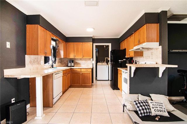 449 Morgan CIR S, Lehigh Acres, FL 33936