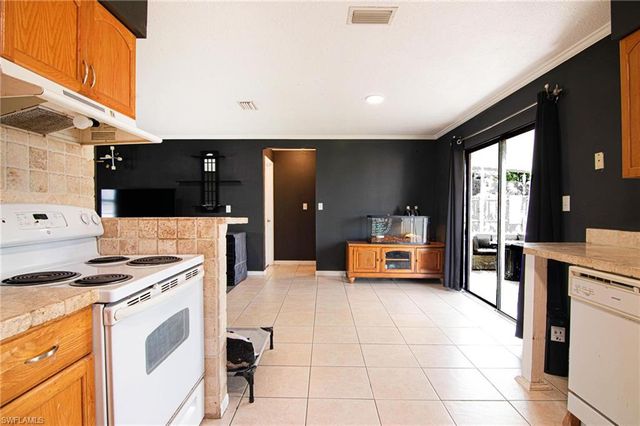 449 Morgan CIR S, Lehigh Acres, FL 33936