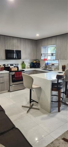 150 NW 17th Ct, Miami, FL 33125