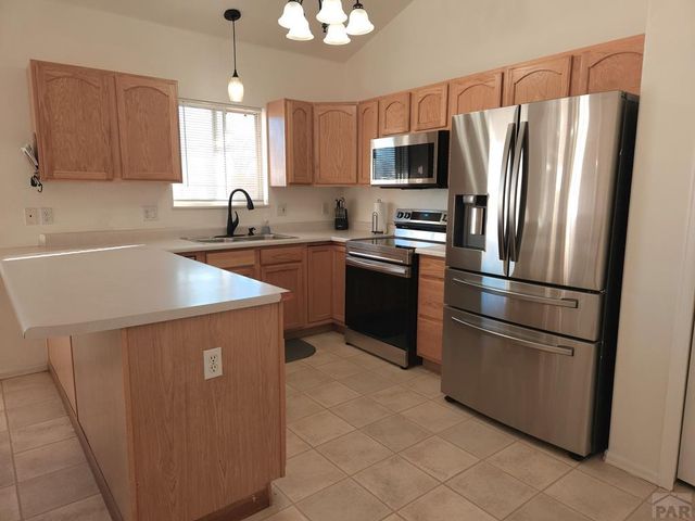 1467 W Plaza De Los Leones Dr, Pueblo West, CO 81007