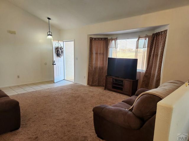 1467 W Plaza De Los Leones Dr, Pueblo West, CO 81007