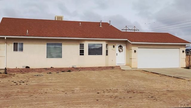 1467 W Plaza De Los Leones Dr, Pueblo West, CO 81007