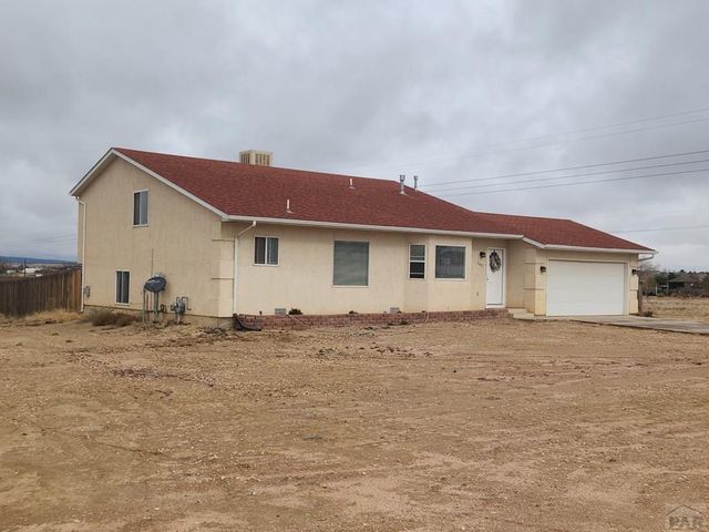 1467 W Plaza De Los Leones Dr, Pueblo West, CO 81007